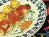 Мерлуза с лук и домати